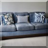 F48. Custom navy sofa. 33”h x 90”w x 40”d 
